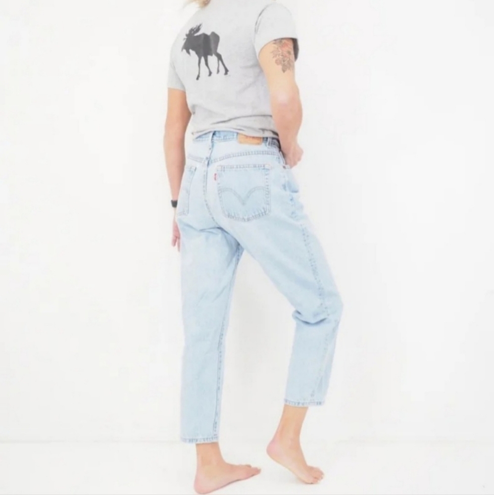 Vintage Levi's 550 Relaxed Fit Tapered Leg Light Wash High Rise Jeans